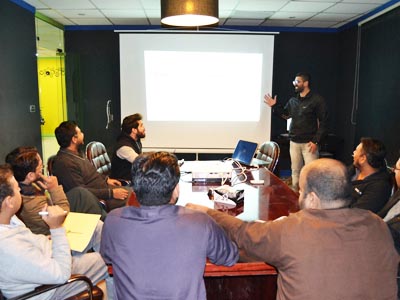 Raheel Khokhar presenting conducting training at I'll Be A PMP